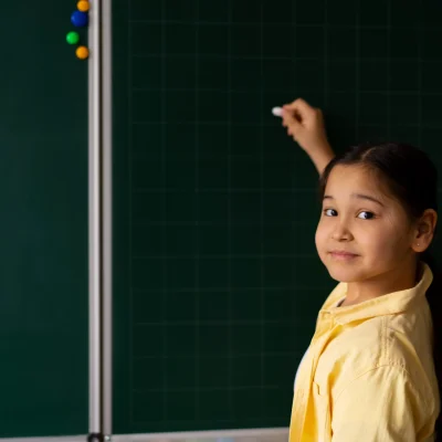 side-view-kid-writing-board